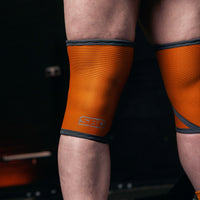 Genouillères 5mm SBD – édition Forge (orange) – maintien et compression pour le squat lourd